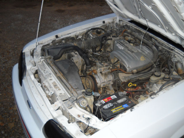 1987 White Ford Mustang Hatchback