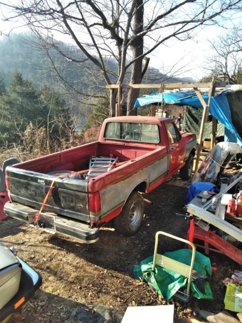 1989 Burgundy Ford F-250 long bed full size hd