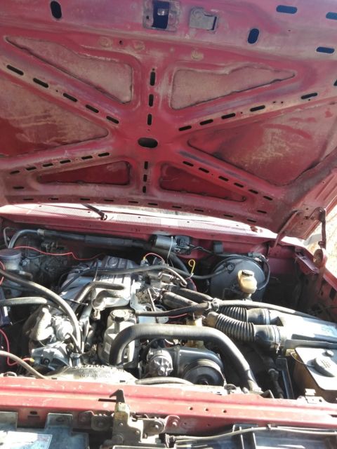 1989 Burgundy Ford F-250 long bed full size hd