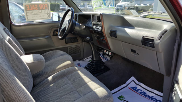 1989 Maroon and White Ford Bronco II SUV