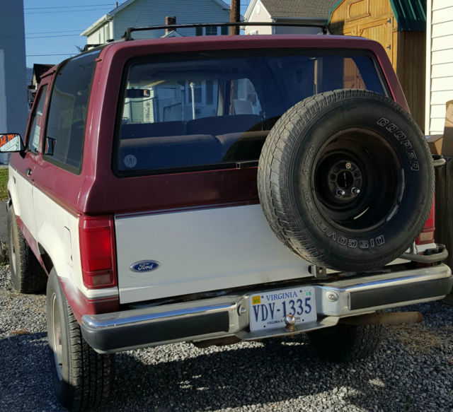 1989 Maroon and White Ford Bronco II SUV