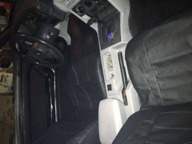 1989 Black Ford Mustang Convertible