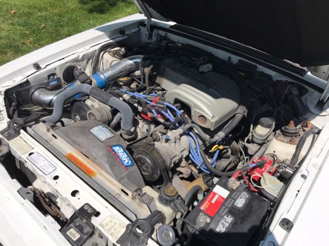 1990 White Ford Mustang