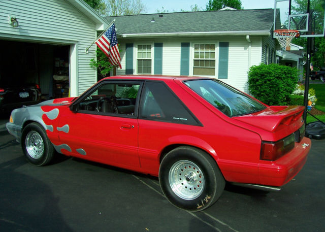 1991 Red with Silver custom painted graphics. Ford Mustang Hatchback