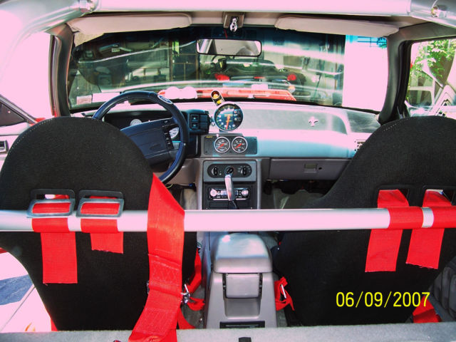 1991 Red with Silver custom painted graphics. Ford Mustang Hatchback