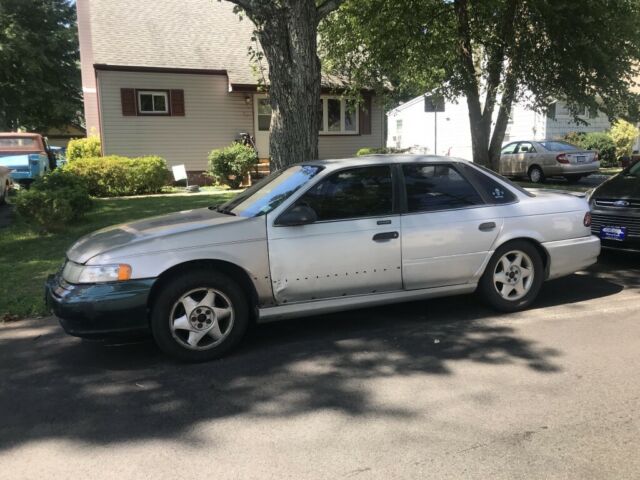 1992 Silver Ford Taurus Sedan