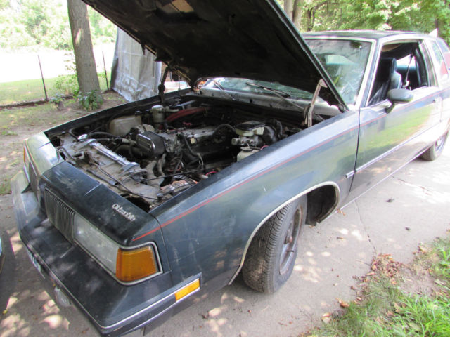 1987 Blue Oldsmobile Cutlass Coupe