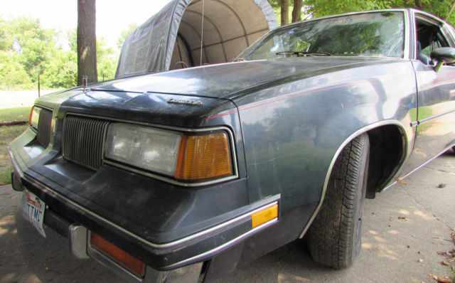 1987 Blue Oldsmobile Cutlass Coupe