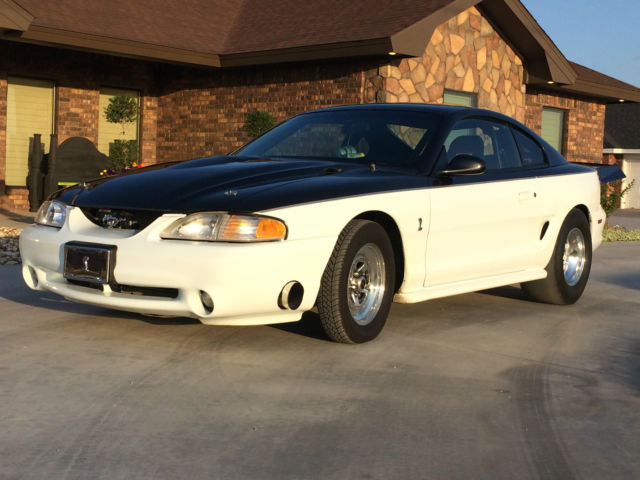 1994 White and Charcoal Ford Mustang Coupe