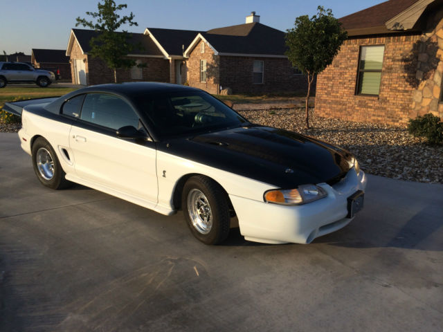1994 White and Charcoal Ford Mustang Coupe