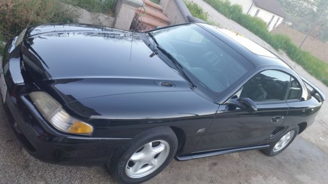 1994 Black Ford Mustang Vehicle does NOT have an existing warranty