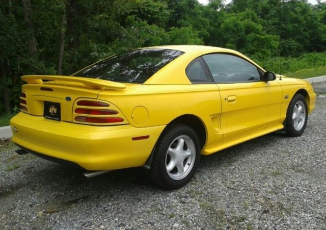 1994 Yellow Ford Mustang Coupe