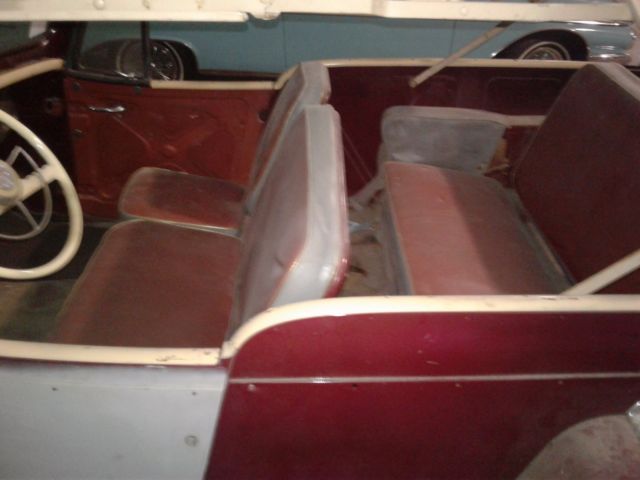 1949 maroon Willys overland jeepster Convertible