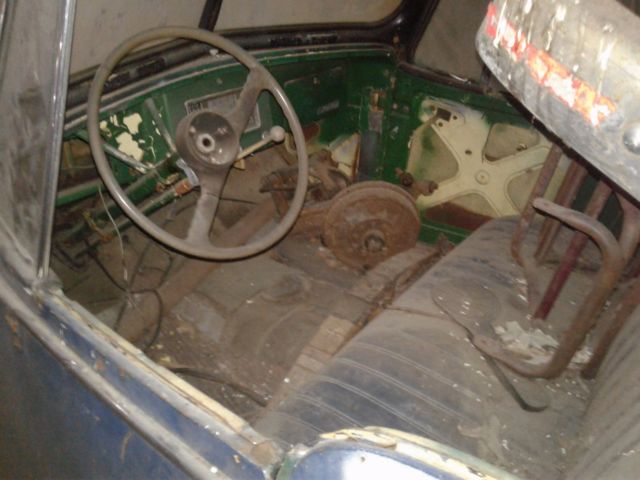 1949 maroon Willys overland jeepster Convertible