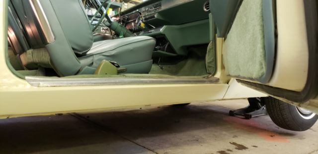 1965 yello Cadillac DeVille convertible