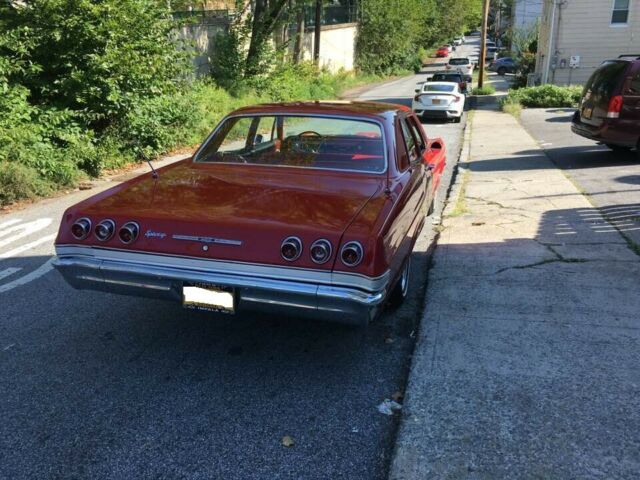 1965 Red Chevrolet Impala Sedan