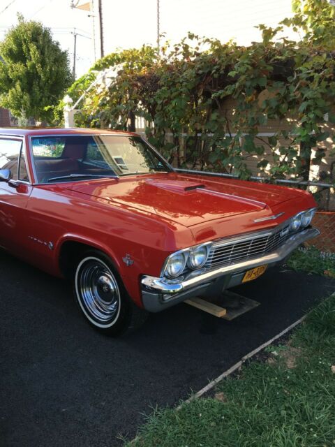 1965 Red Chevrolet Impala Sedan