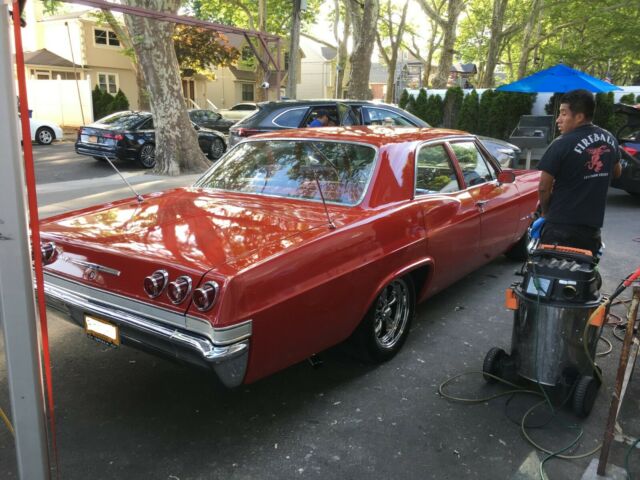 1965 Red Chevrolet Impala Sedan