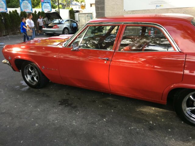 1965 Red Chevrolet Impala Sedan