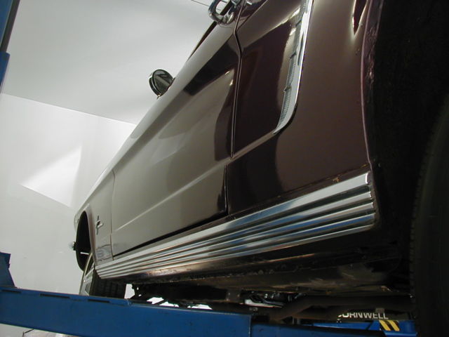 1965 Burgundy Ford Mustang Coupe