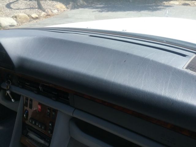 1990 White Mercedes-Benz 500-Series Sedan