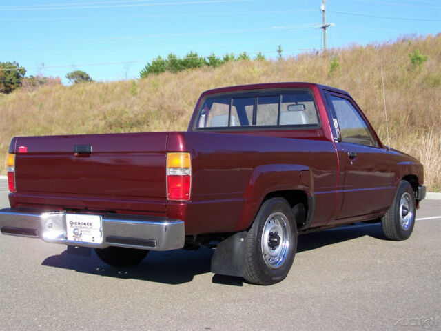 1988 Red Toyota Tacoma Pickup Truck
