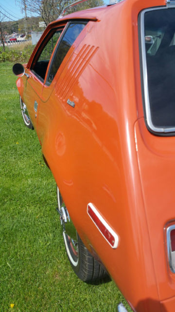 1974 orange AMC Gremlin coupe