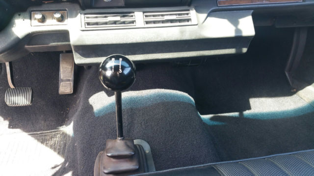 1974 orange AMC Gremlin coupe