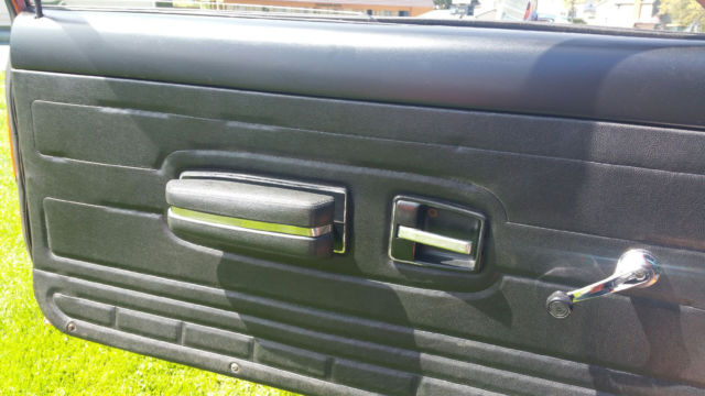 1974 orange AMC Gremlin coupe