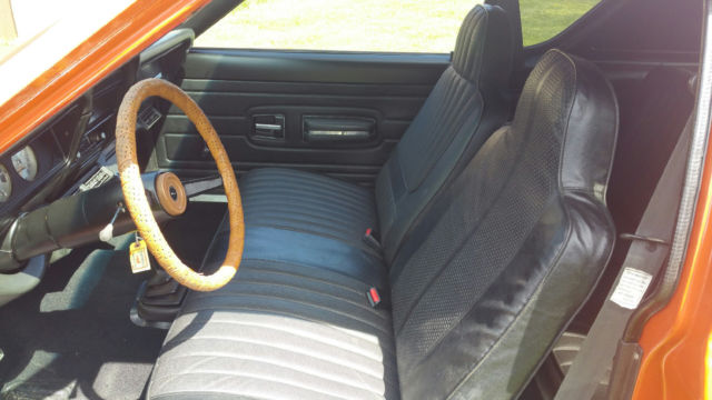 1974 orange AMC Gremlin coupe