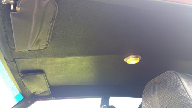 1974 orange AMC Gremlin coupe