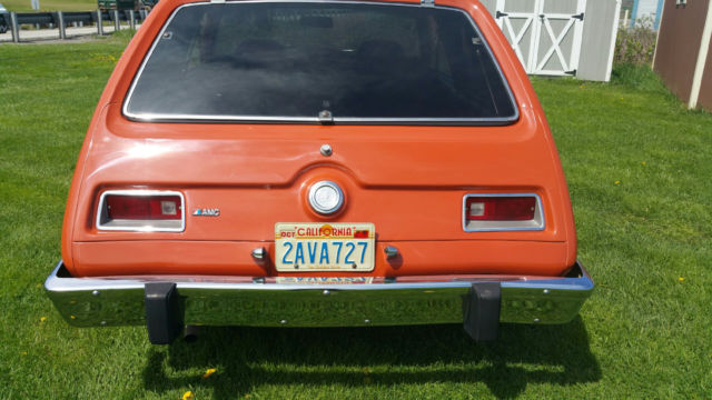 1974 orange AMC Gremlin coupe