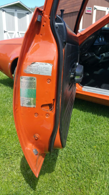 1974 orange AMC Gremlin coupe