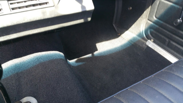 1974 orange AMC Gremlin coupe