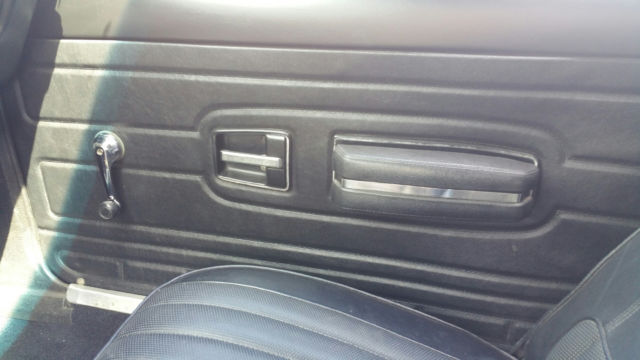 1974 orange AMC Gremlin coupe