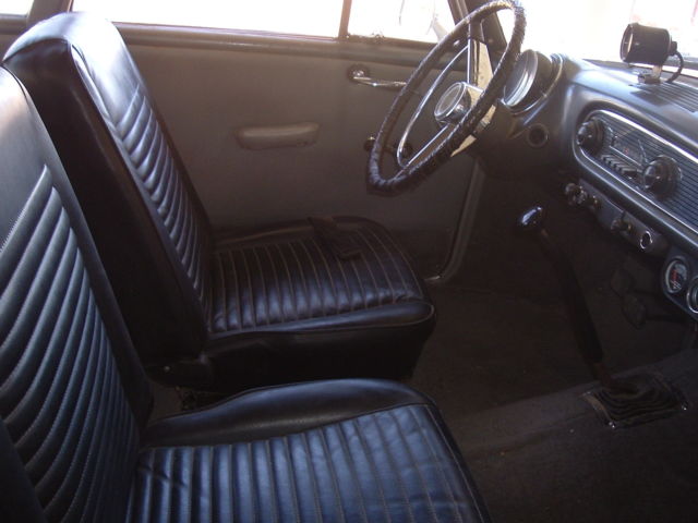 1960 green AMC rambler american coupe