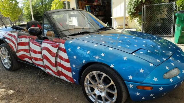 1993 Stars, Stripes & blue over black Mazda MX-5 Miata Convertible