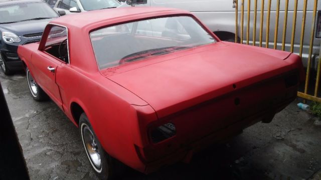 1964 Red Ford Mustang Coupe