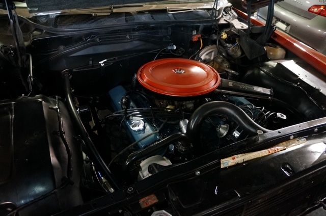 1968 Red Cadillac DeVille Convertible