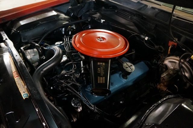 1968 Red Cadillac DeVille Convertible