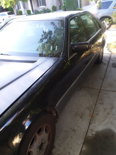 1992 Black Mercedes-Benz 500-Series Sedan