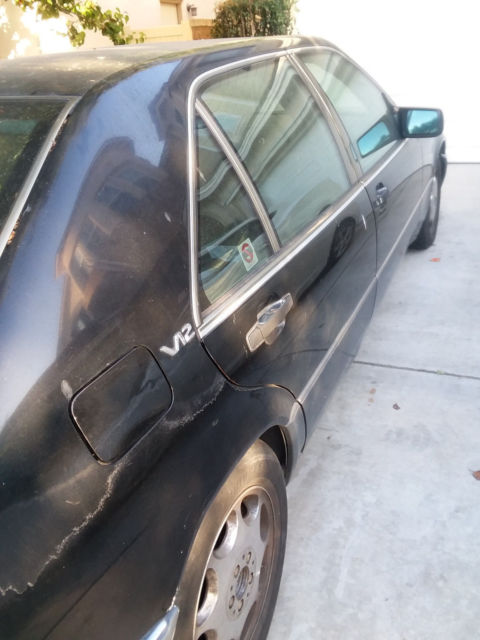 1992 Black Mercedes-Benz 500-Series Sedan