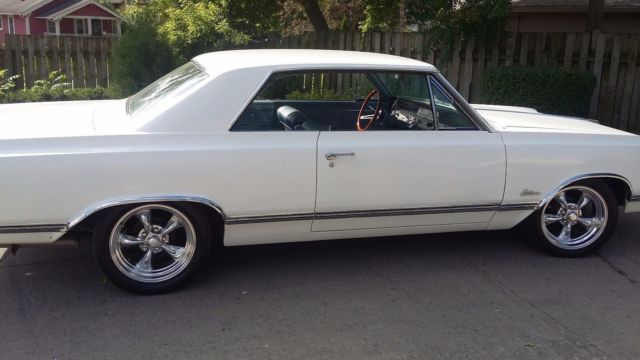 1965 White Oldsmobile Cutlass Coupe