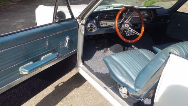 1965 White Oldsmobile Cutlass Coupe