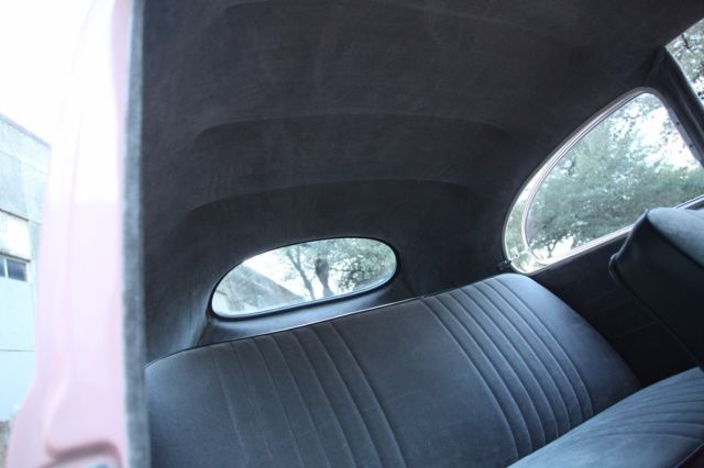 1957 pink Volkswagen Beetle - Classic