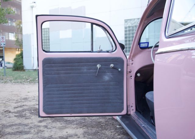 1957 pink Volkswagen Beetle - Classic