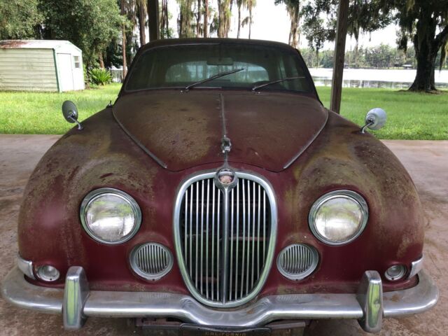 1965 red Jaguar 3.8 Sedan