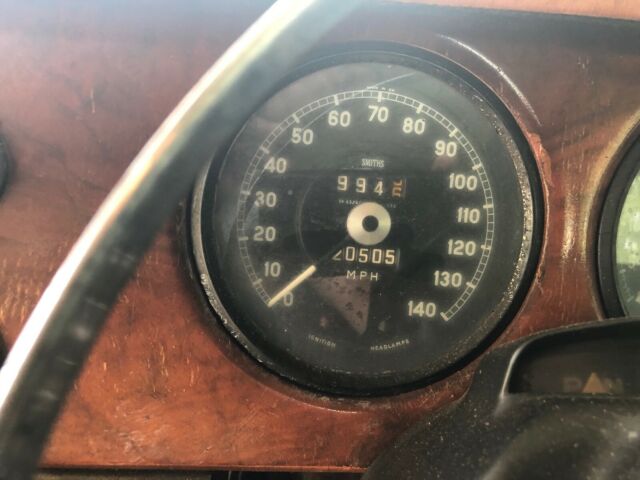 1965 red Jaguar 3.8 Sedan