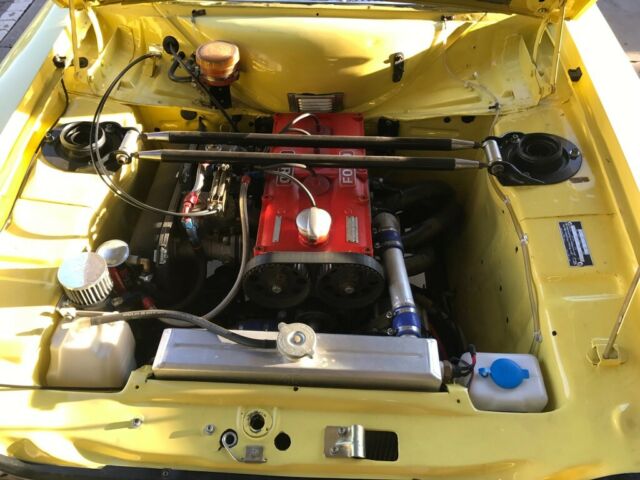 1972 Yellow Ford Escort Coupe