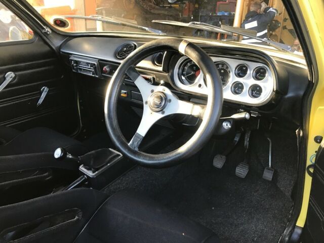 1972 Yellow Ford Escort Coupe